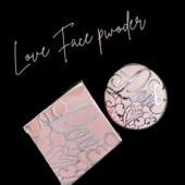 Swatches of Blissful Shine lip gloss on a hand.