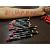 Flat lay of Huda Beauty eyeliner pencils in various shades, highlighting their creamy texture